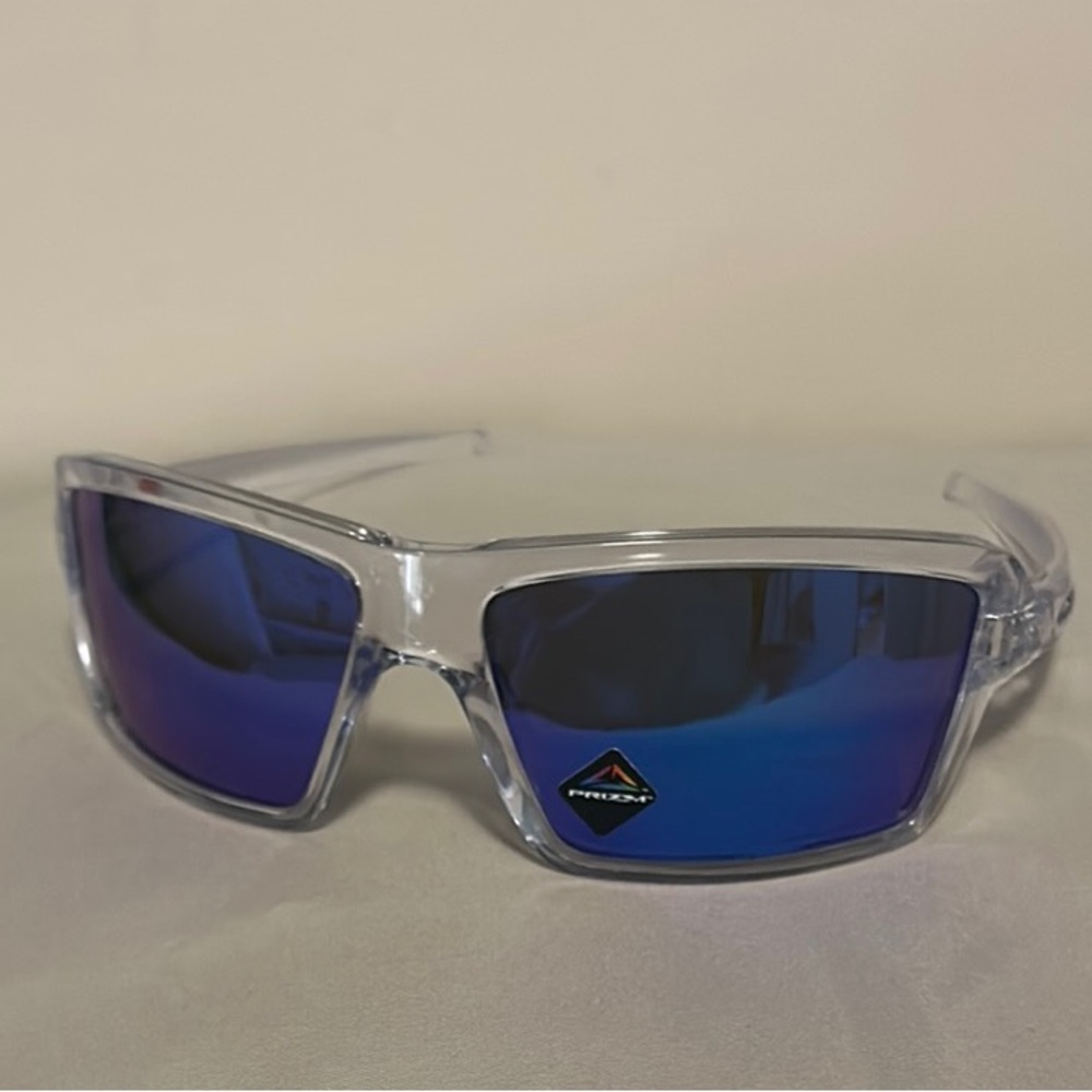 Oakley Clear Frame Sunglasses with Blue Lenses